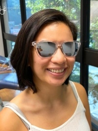 Orthodontic team member in sunglasses smiling