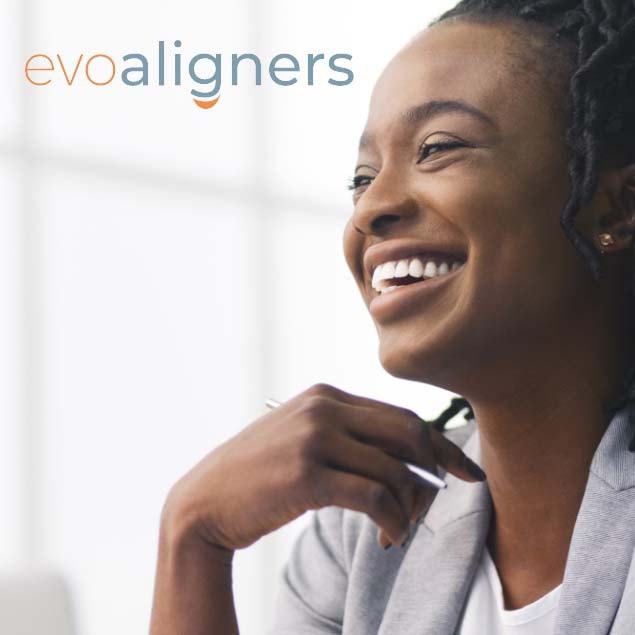 Woman smiling during EvoAligners treatment